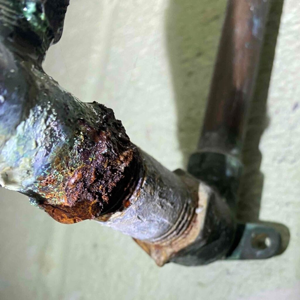 corroded lead pipe